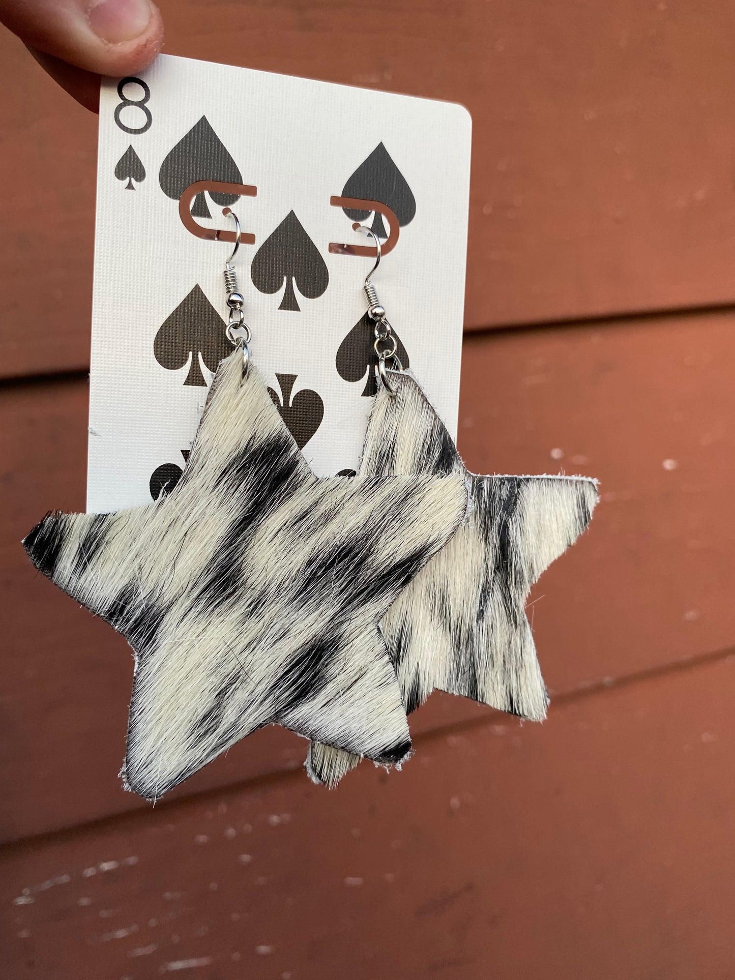 XL cowhide star earrings