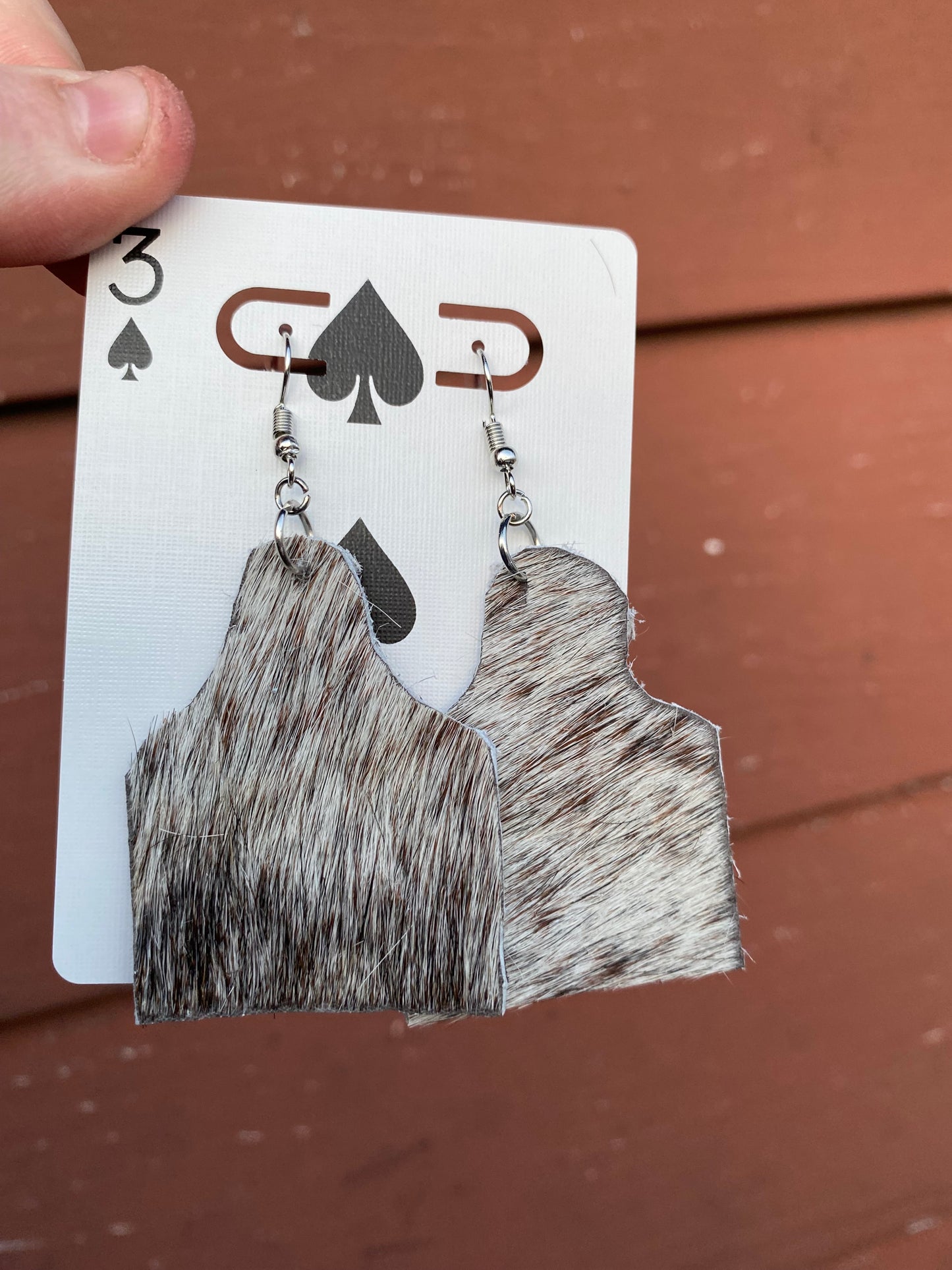 Dangle cow tag earrings