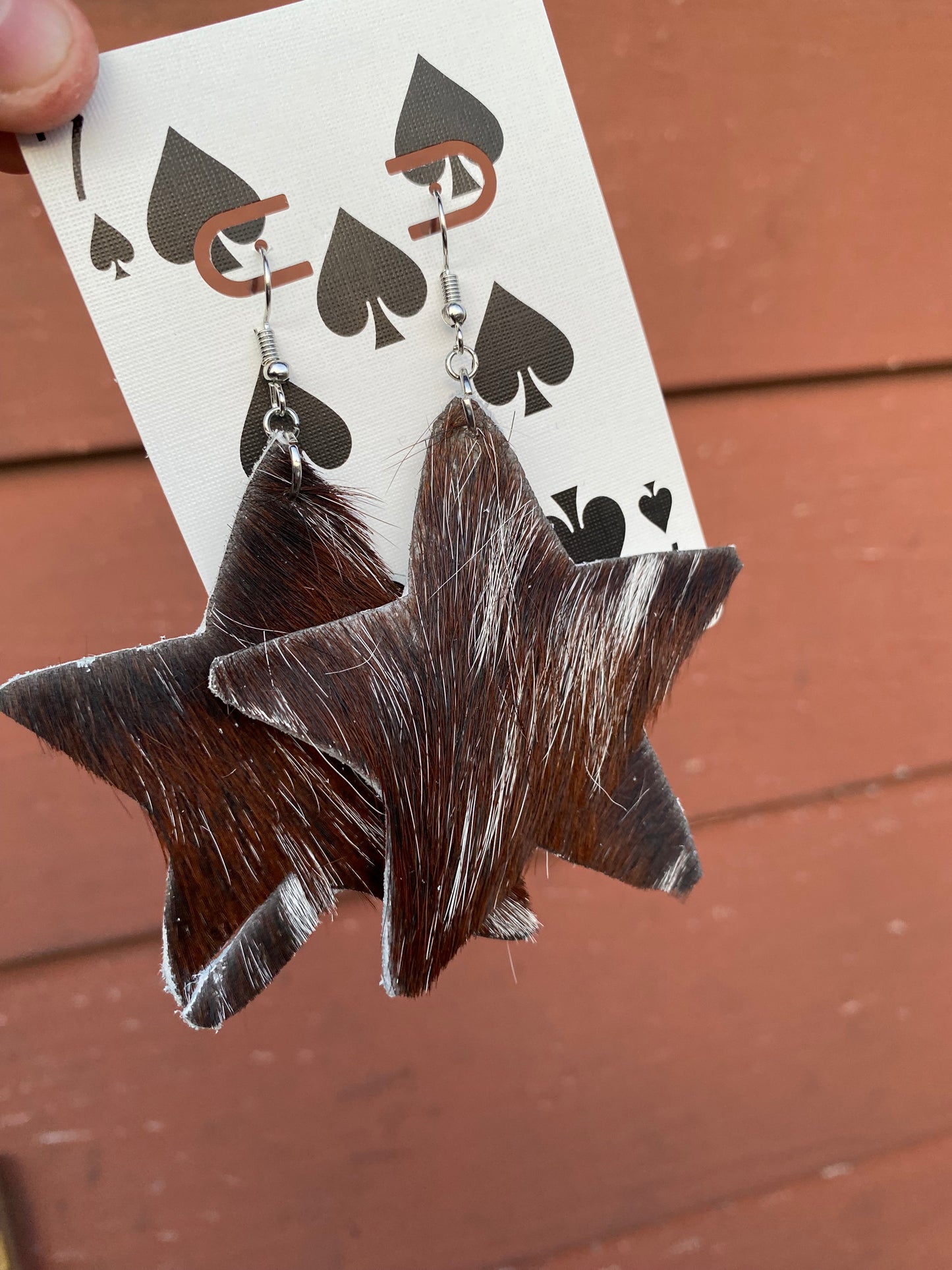 XL cowhide star earrings