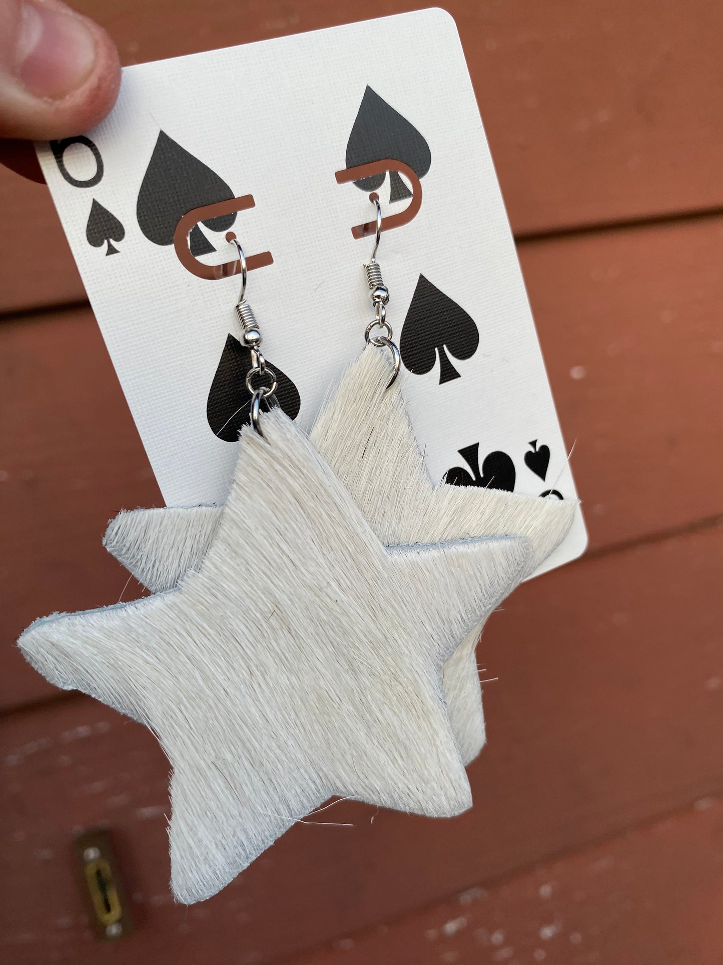 XL cowhide star earrings