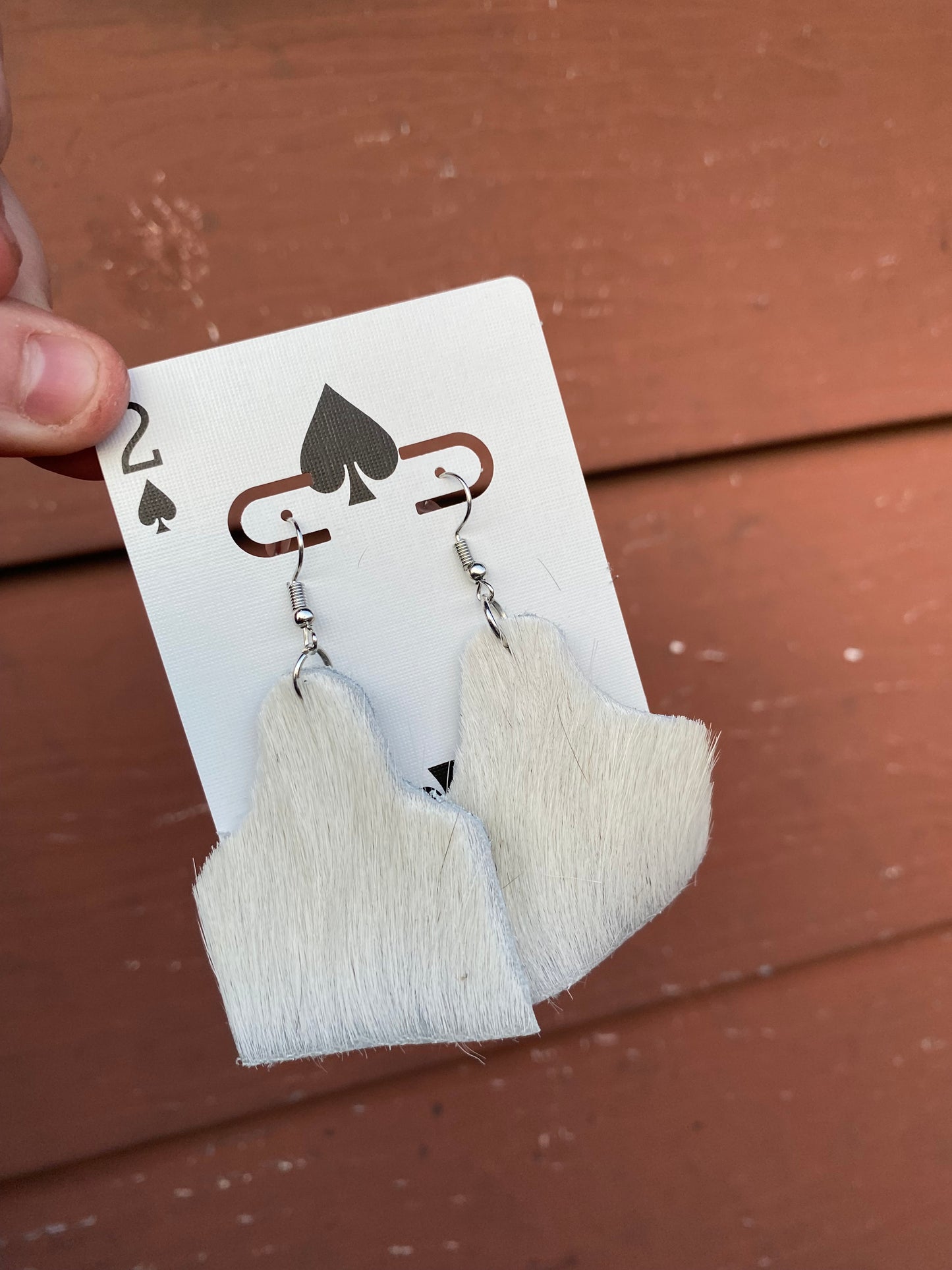 Dangle cow tag earrings